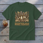 Green t-shirt with "Mountain Gold Morel Harvest" text and a mushroom graphic.