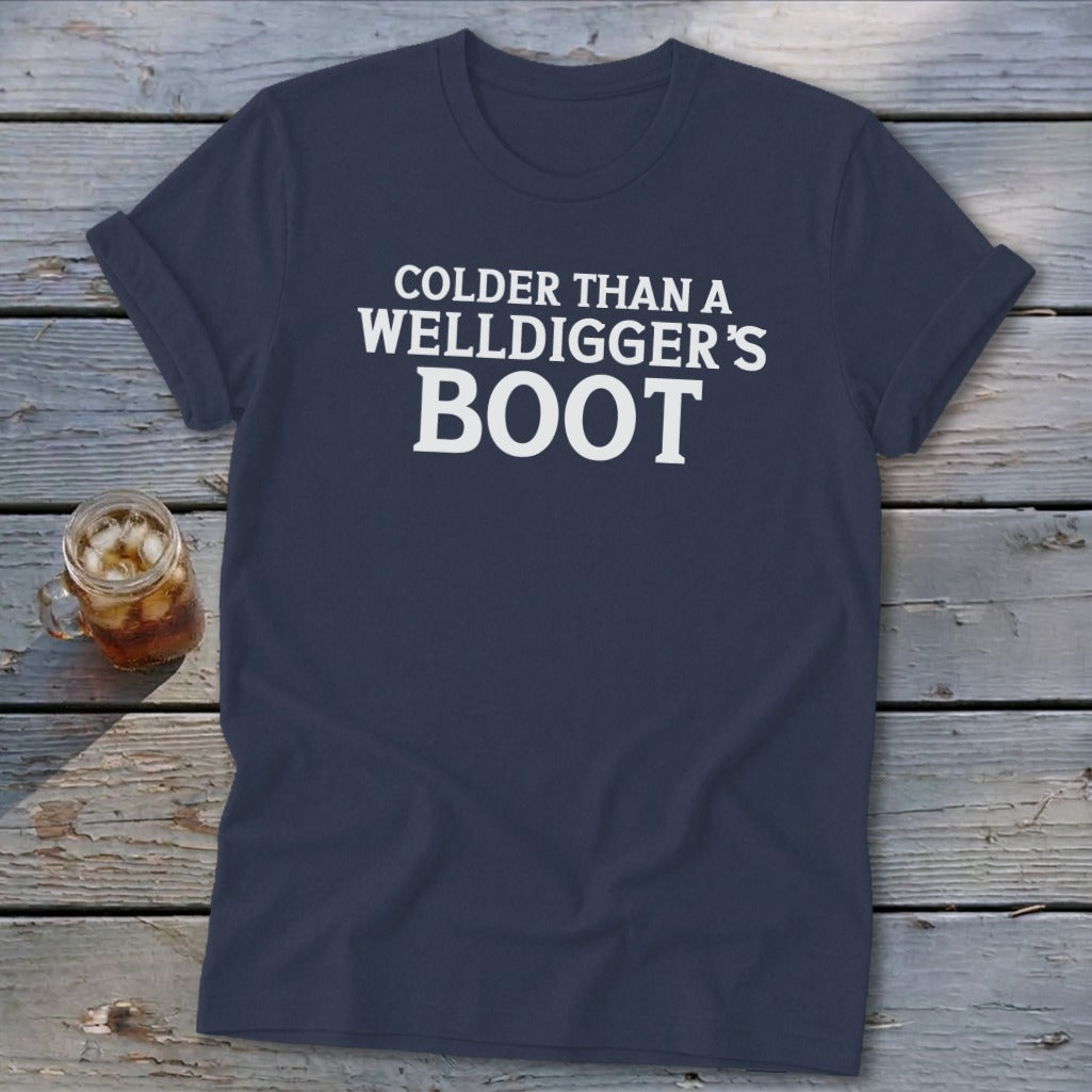 Navy t-shirt with white text reading "Colder Than a Welldigger's Boot".