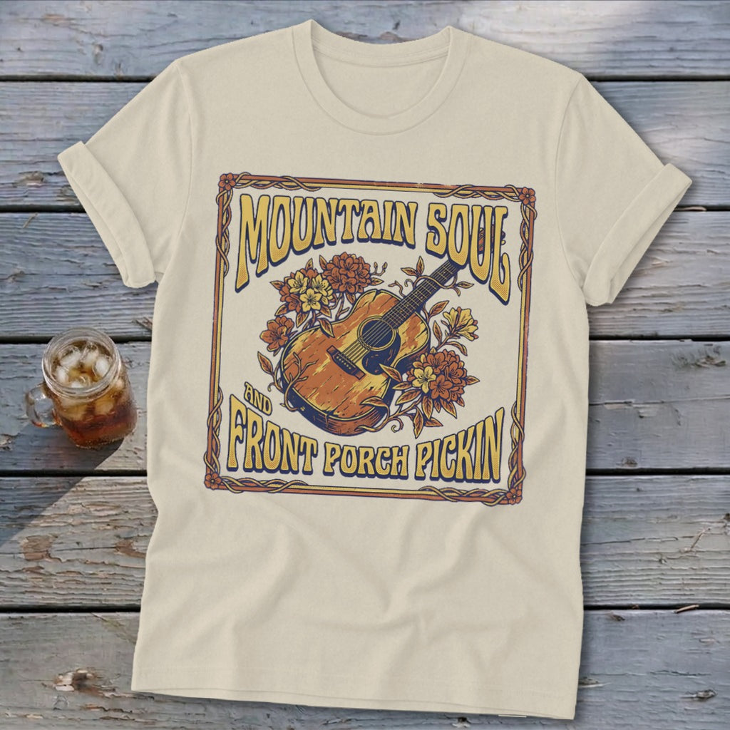 Cream t-shirt with "Mountain Soul and Front Porch Pickin'" text and guitar graphic.
