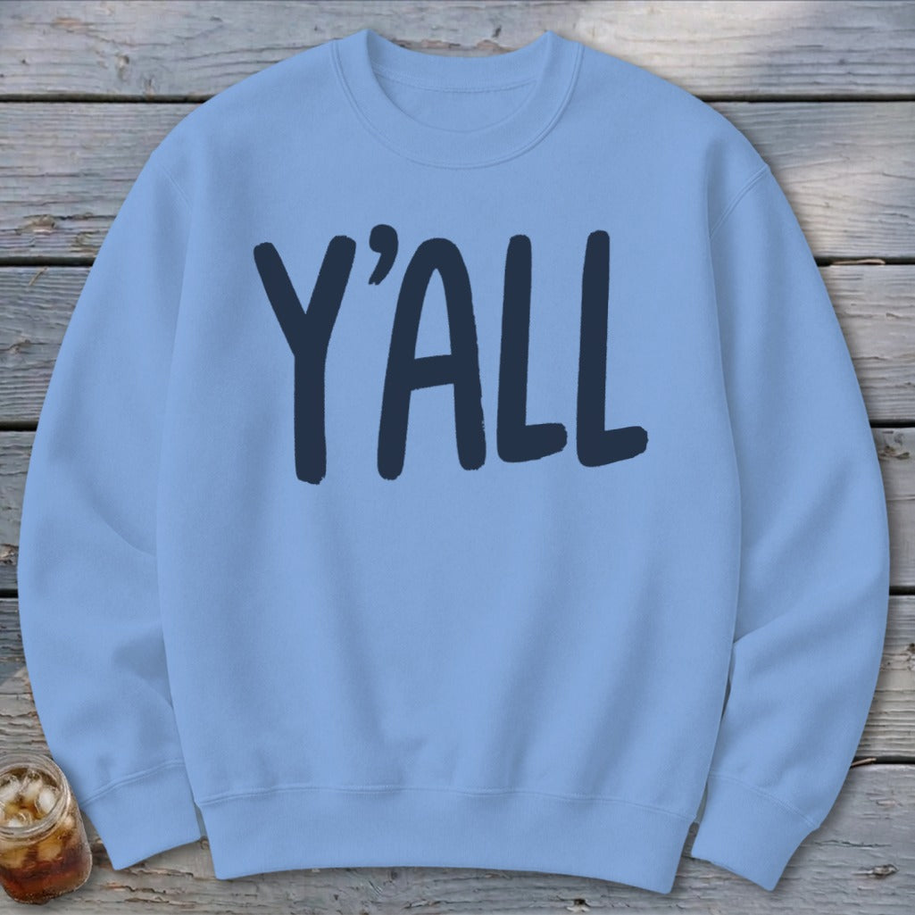 Light blue sweatshirt with "Y'ALL" printed in dark blue.