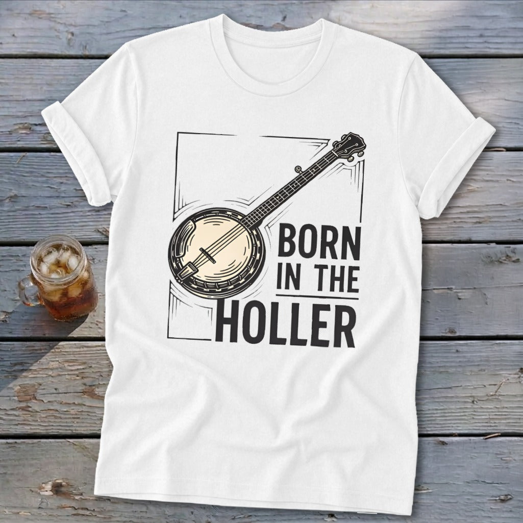 White t-shirt with banjo illustration and text "BORN IN THE HOLLER".