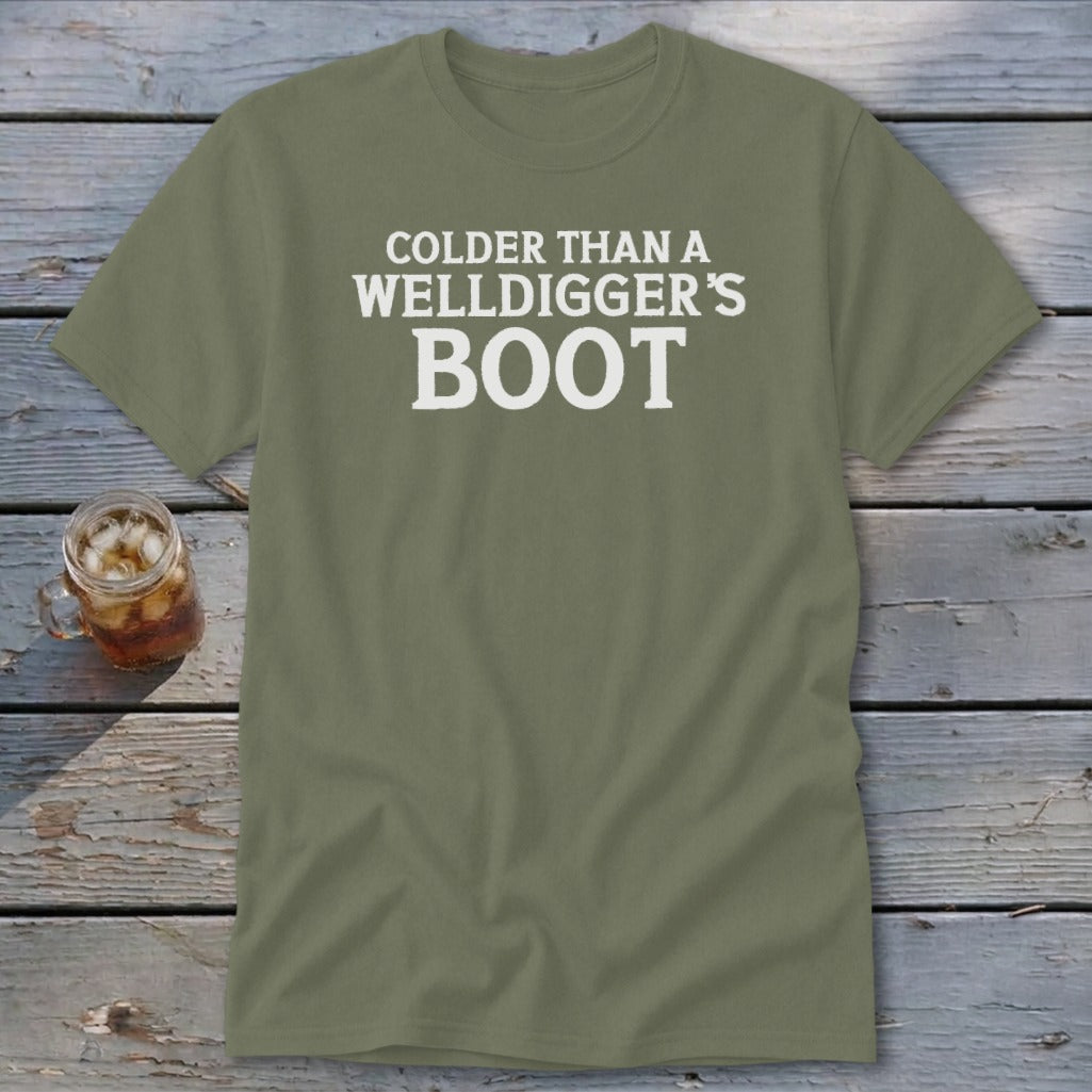 Olive green t-shirt with white text that reads "COLDER THAN A WELLDIGGER'S BOOT".