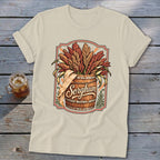 T-shirt with a wooden barrel overflowing with sorghum and the word "Sorghum"
