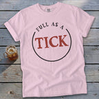 Light pink t-shirt with "FULL AS A TICK" text in a circle.