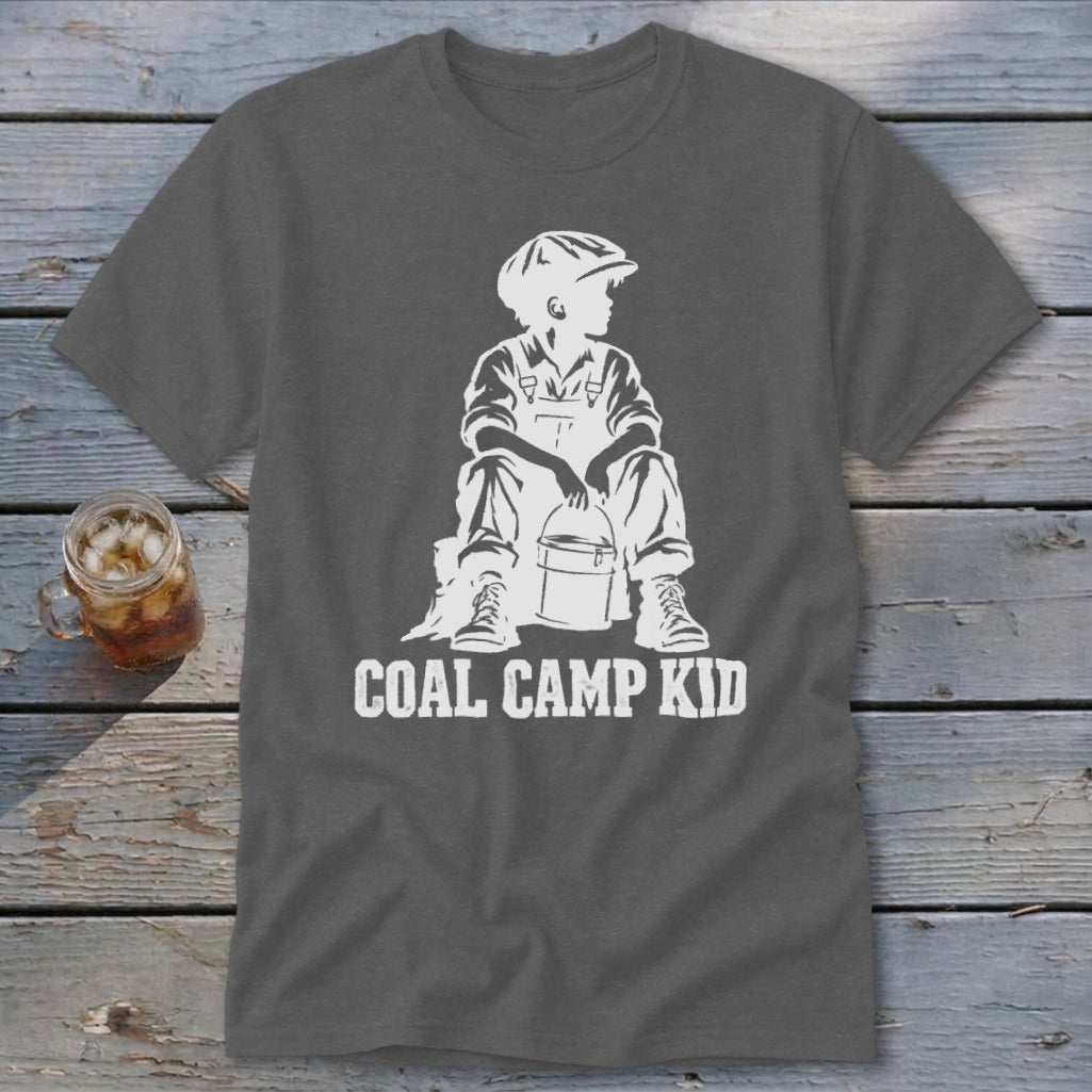 Graphic t-shirt with white stencil art of a child in overalls holding a bucket, text reads "COAL CAMP KID".