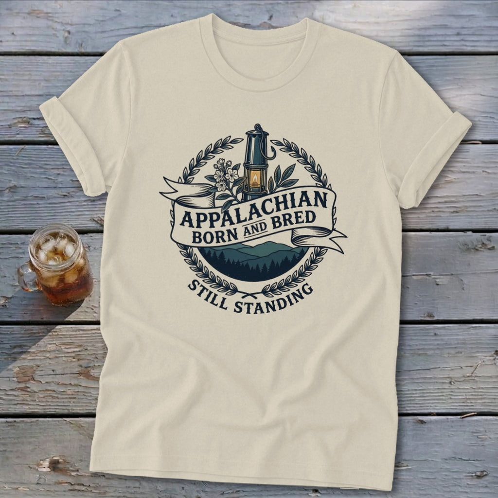 Cream t-shirt with "Appalachian Born and Bred Still Standing" text and lantern graphic.