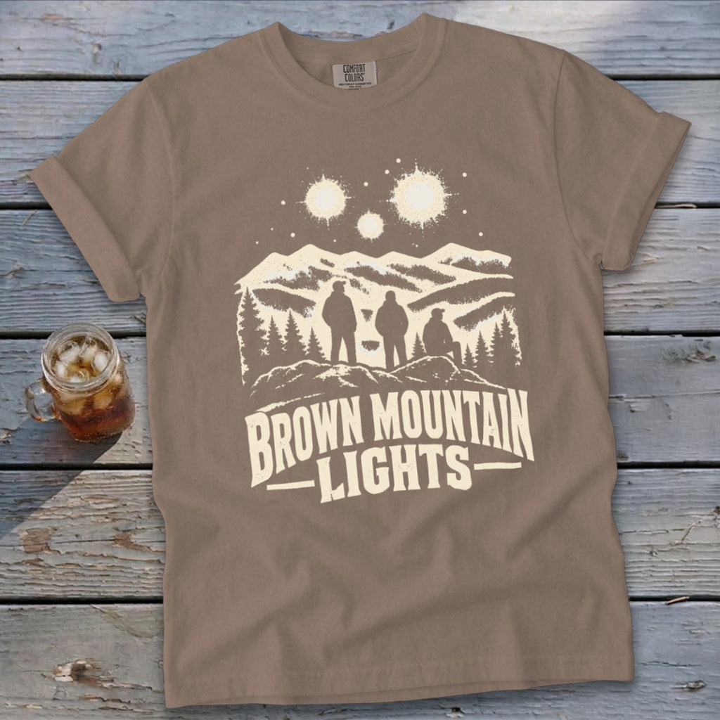 Brown short-sleeve t-shirt featuring a mountain graphic and the text Brown Mountain Lights.
