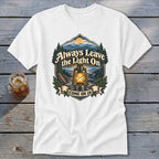 White t-shirt with vintage outdoor scene, lantern, and text "Always Leave the Light On Come On In".