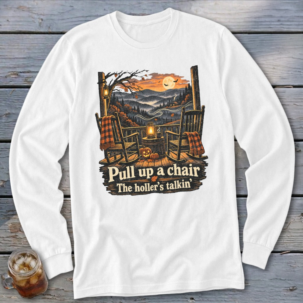 Long sleeve t-shirt with fall porch scene, rocking chairs, pumpkins, and text.