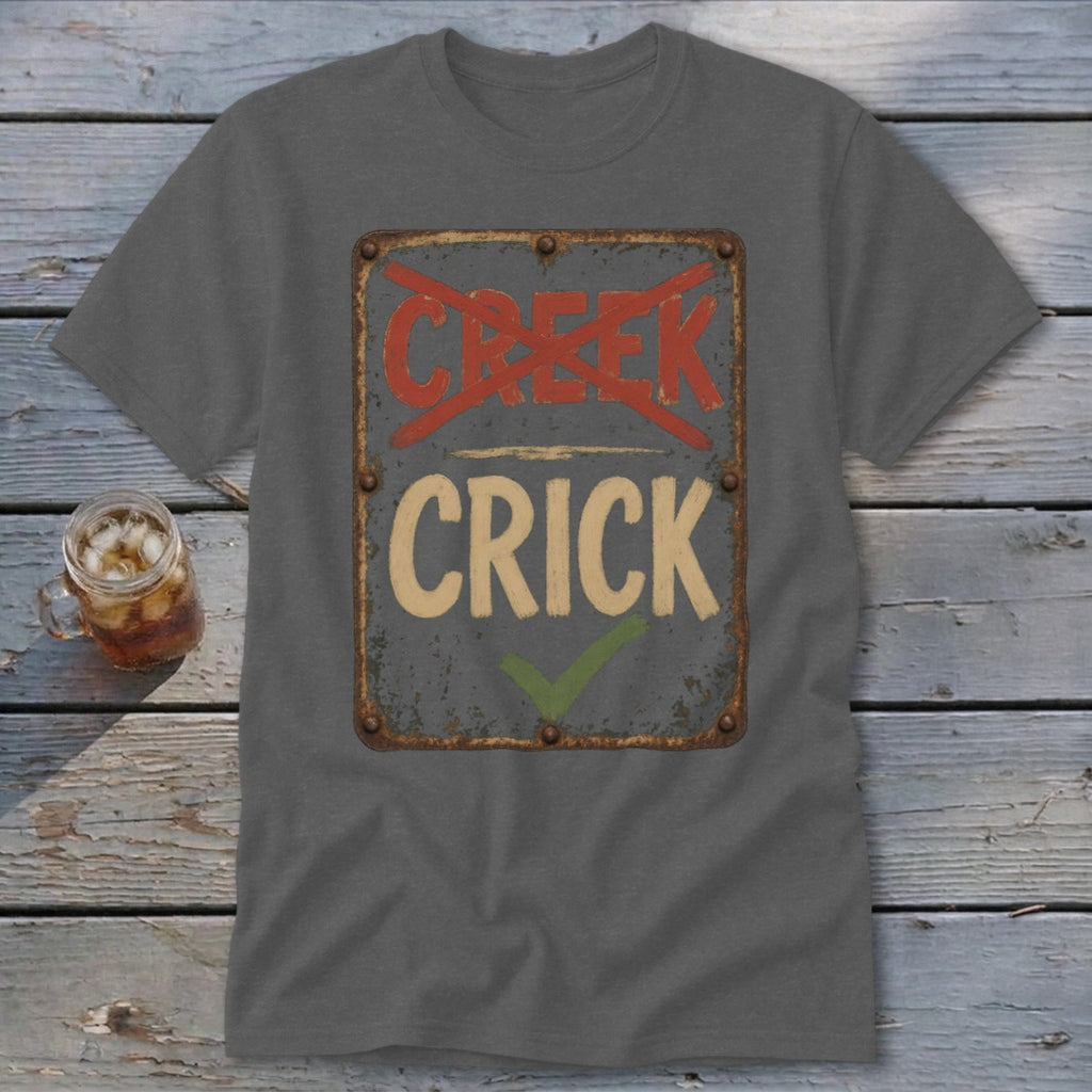 Gray t-shirt with a sign graphic saying "CRICK" with a checkmark and "CREEK" crossed out.