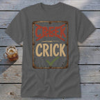Gray t-shirt with a sign graphic saying "CRICK" with a checkmark and "CREEK" crossed out.