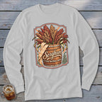 Barrel overflowing with sorghum stalks with "Sorghum" text and rustic border.
