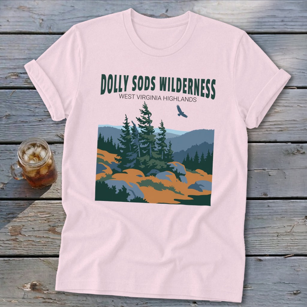 Light pink t-shirt featuring a green graphic and text reading Dolly Sods Wilderness West Virginia Highlands.