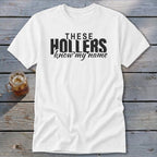 White t-shirt with black text: "THESE HOLLERS know my name."