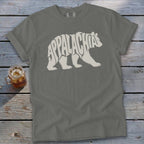 Charcoal gray t-shirt featuring a white graphic of a walking bear filled with the word Appalachia.