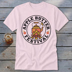 Pink t-shirt with "Apple Butter Festival" logo featuring a teapot over a campfire.