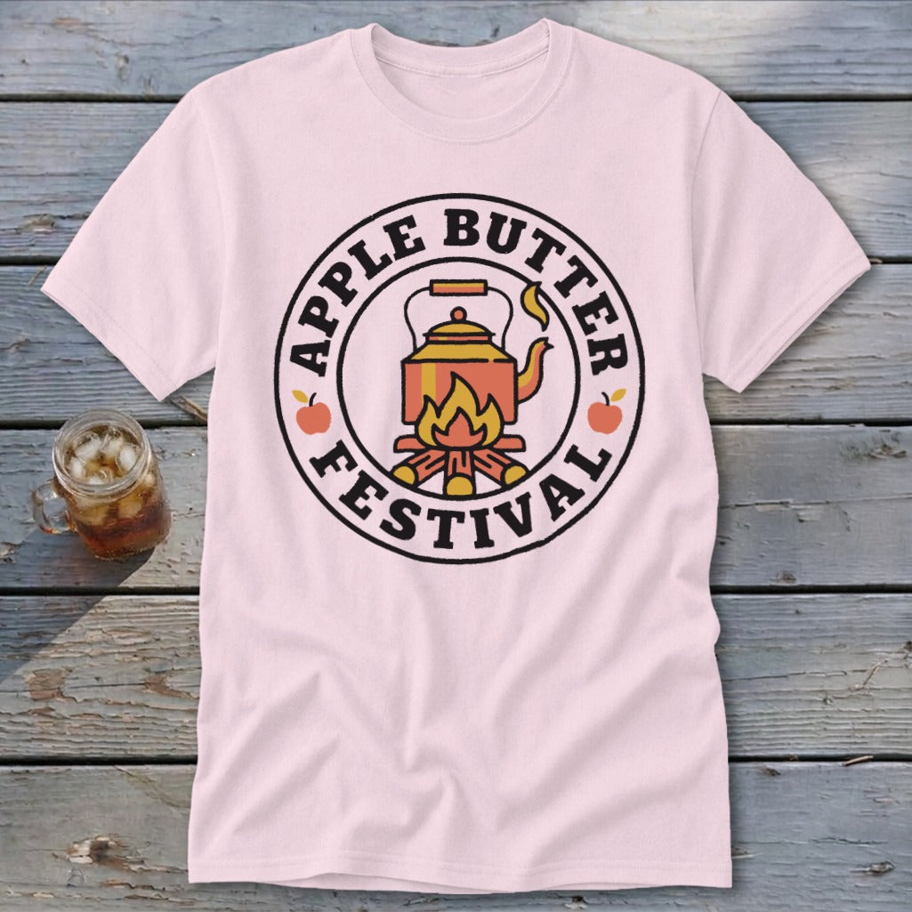 Pink t-shirt with "Apple Butter Festival" logo featuring a teapot over a campfire.