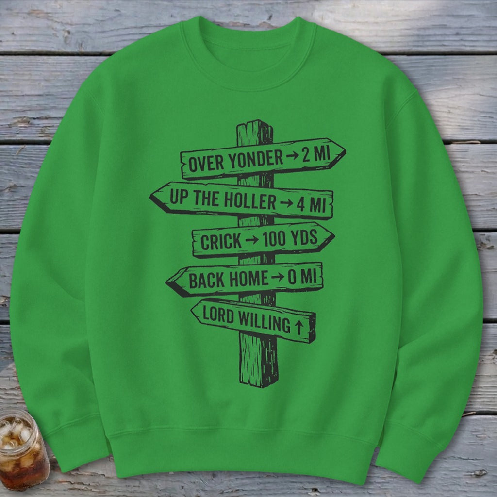 A bright green crewneck sweatshirt featuring a black graphic of a wooden signpost with directional text.