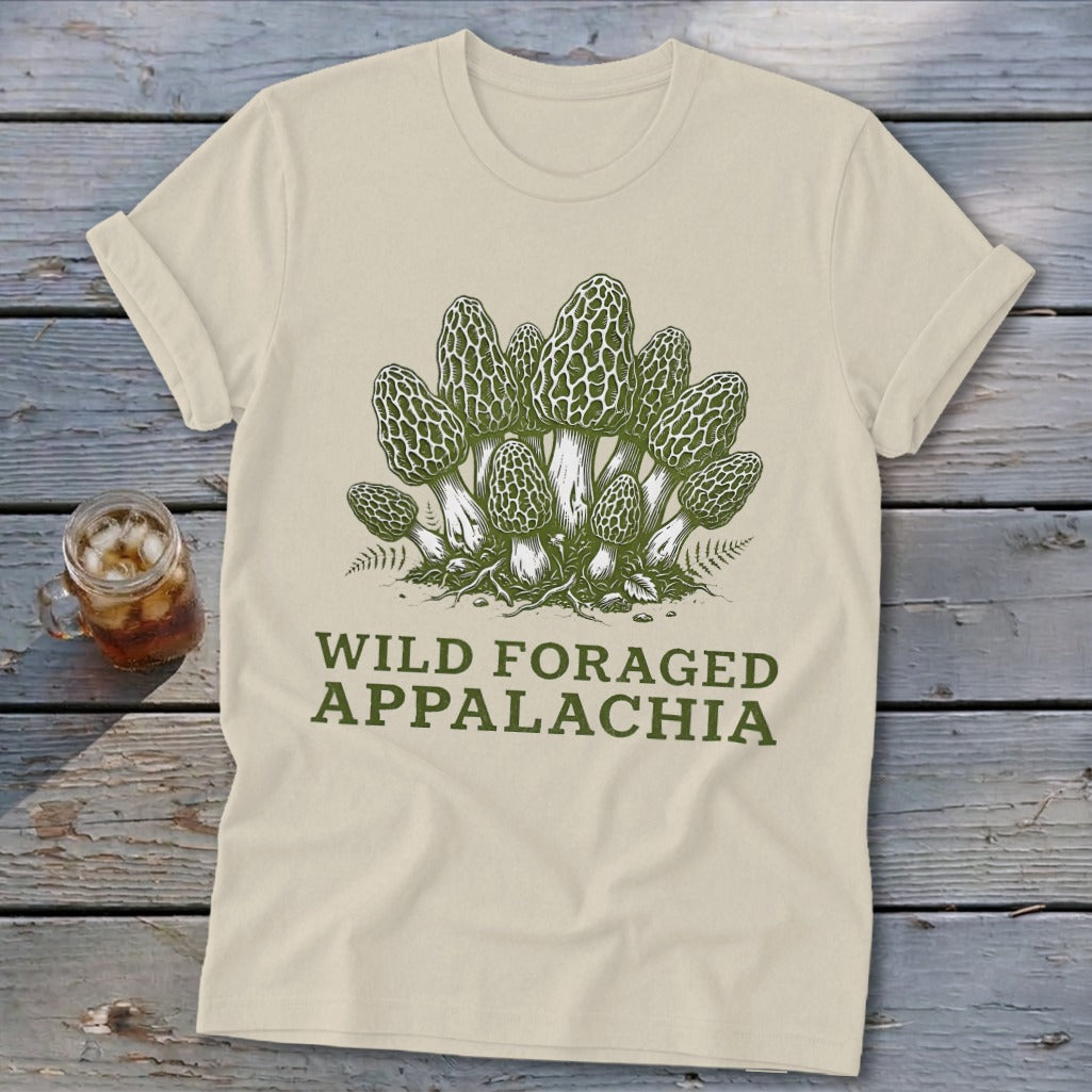 Cream t-shirt with a graphic of morel mushrooms and text "WILD FORAGED APPALACHIA".