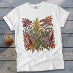 White Comfort Colors t-shirt featuring a detailed botanical print of fall wildflowers and foliage.