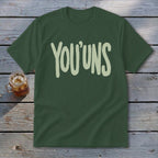 Green t-shirt with light green "YOU'UNS" text and a glass of iced tea.