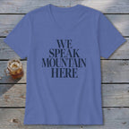 Purple V-neck t-shirt with "WE SPEAK MOUNTAIN HERE" text.