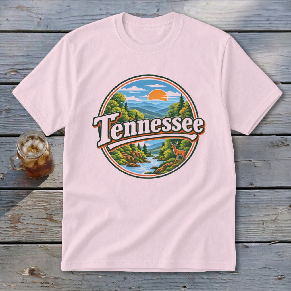 Pink t-shirt with a circular graphic depicting a Tennessee landscape with text.