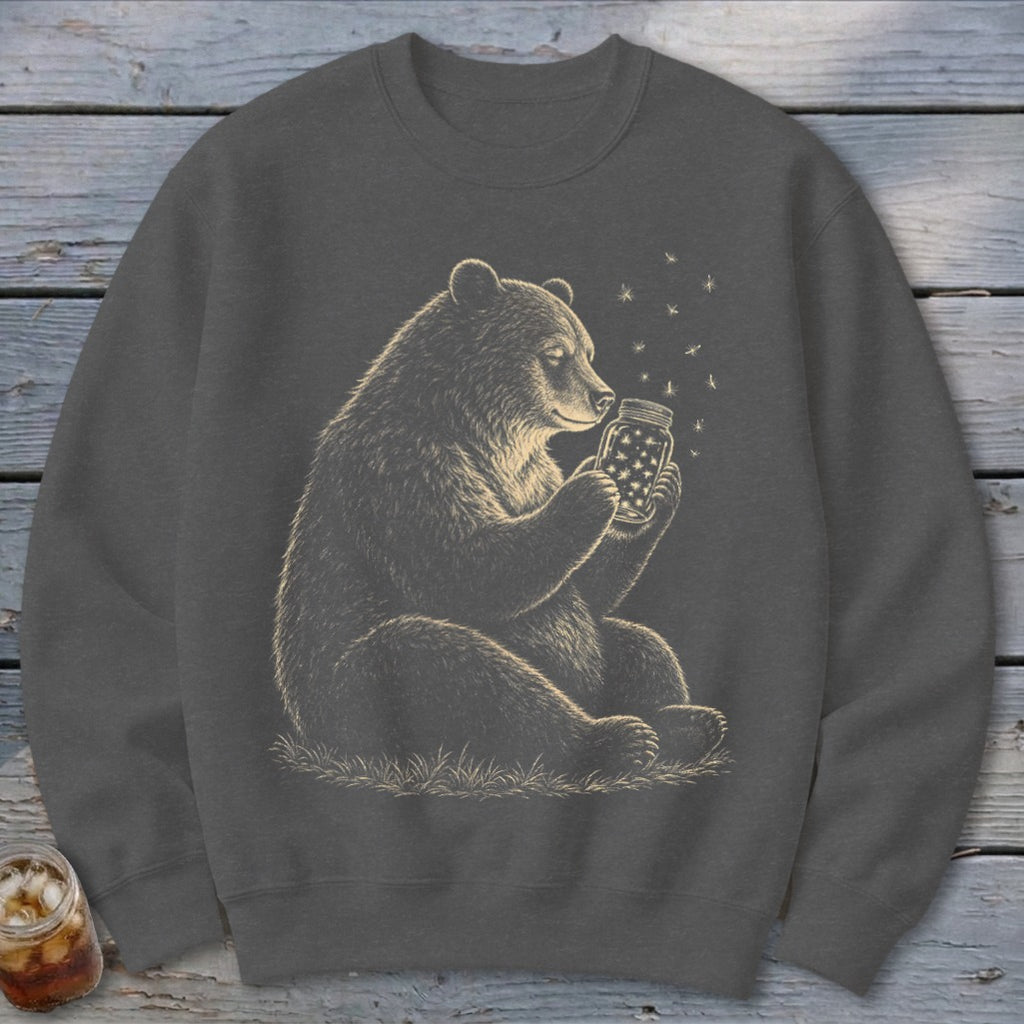 Bear holding a jar filled with stars and fireflies.