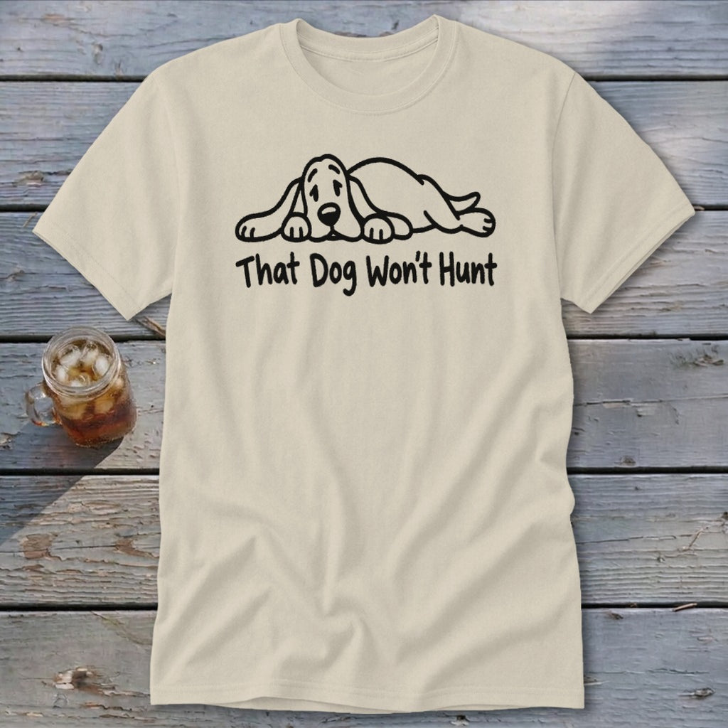 A cream-colored t-shirt with a line drawing of a sleeping dog and the text "That Dog Won't Hunt".