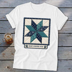 White t-shirt featuring an eight-pointed star quilt block design with text.