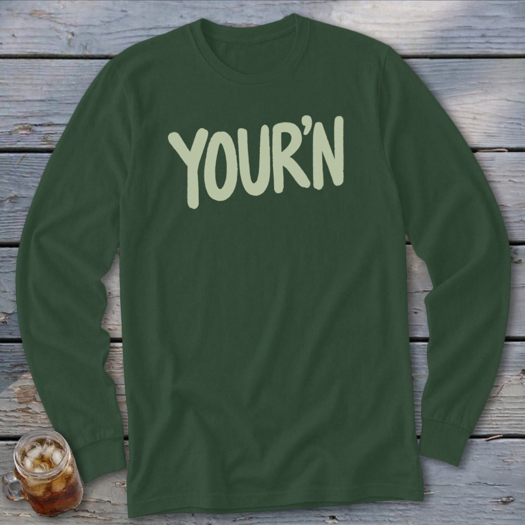 Dark green long sleeve shirt with "YOUR'N" printed in light green lettering.
