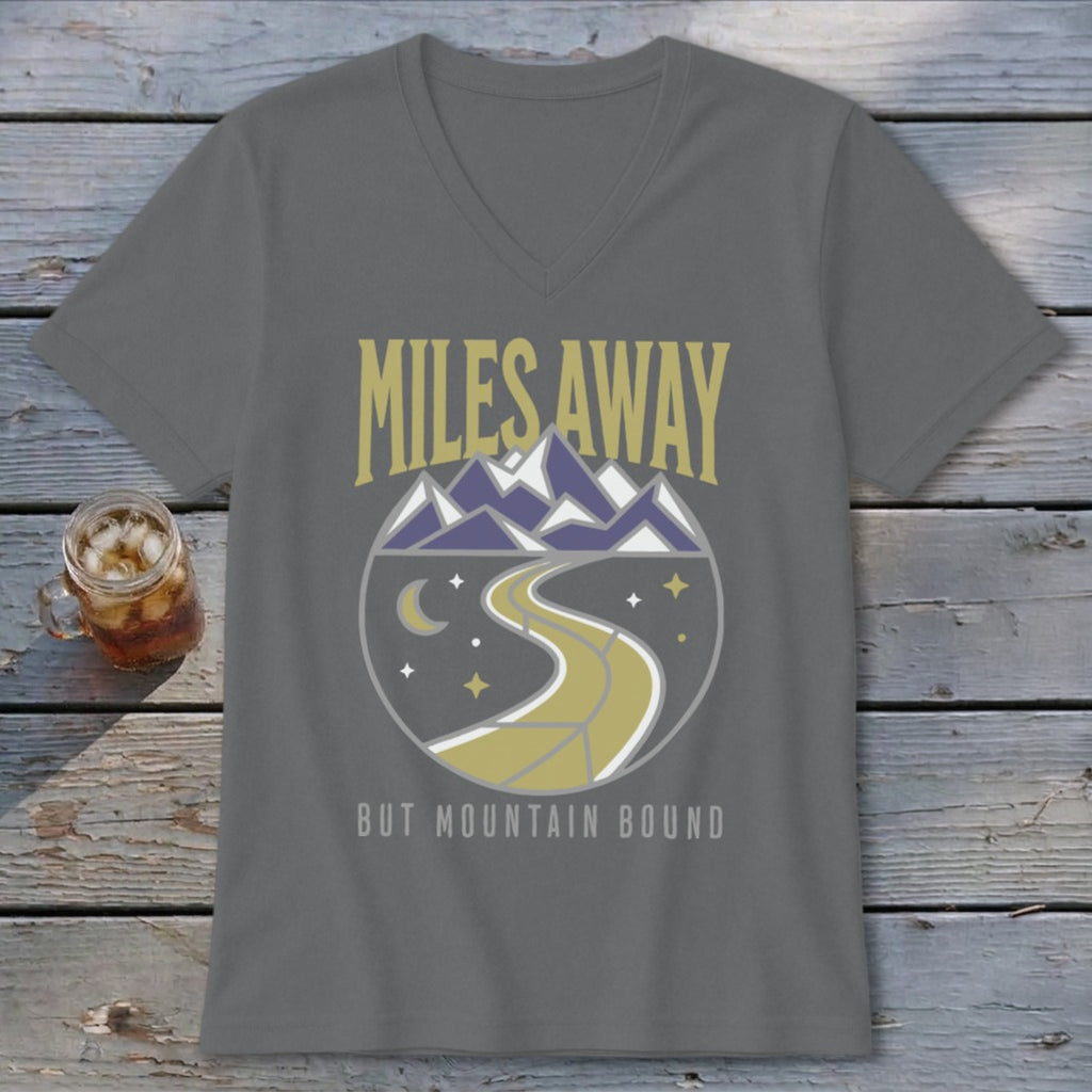 Gray t-shirt with "MILES AWAY BUT MOUNTAIN BOUND" text and mountain road graphic.