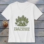 White t-shirt with a green illustration of morel mushrooms and "WILD FORAGED APPALACHIA" text.