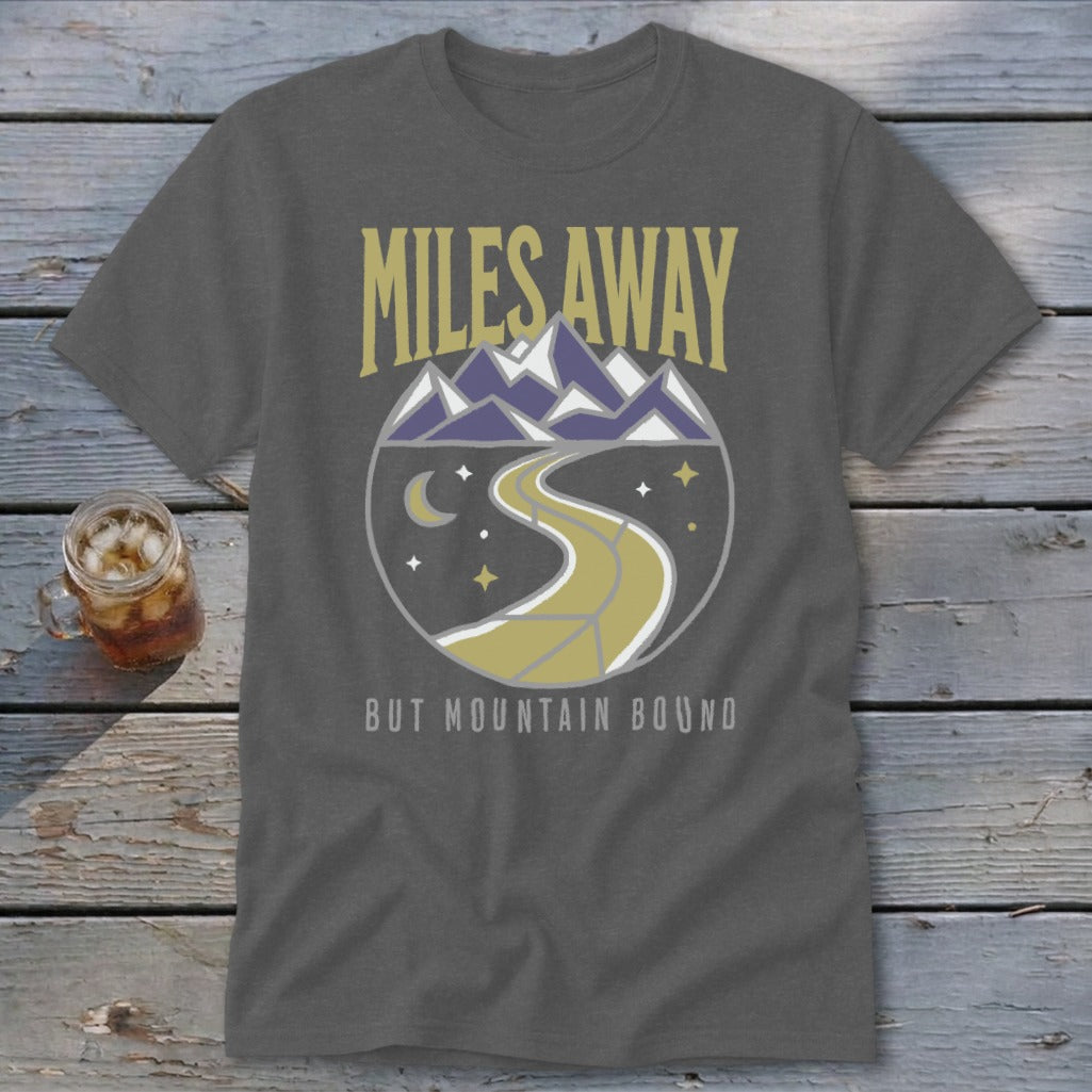 Dark gray t-shirt with "Miles Away But Mountain Bound" text and mountain landscape graphic.