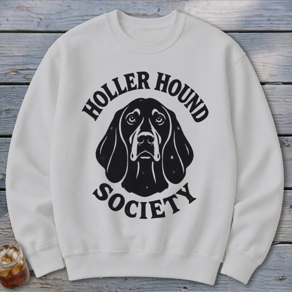 White sweatshirt with black "Holler Hound Society" text and dog illustration.