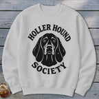 White sweatshirt with black "Holler Hound Society" text and dog illustration.