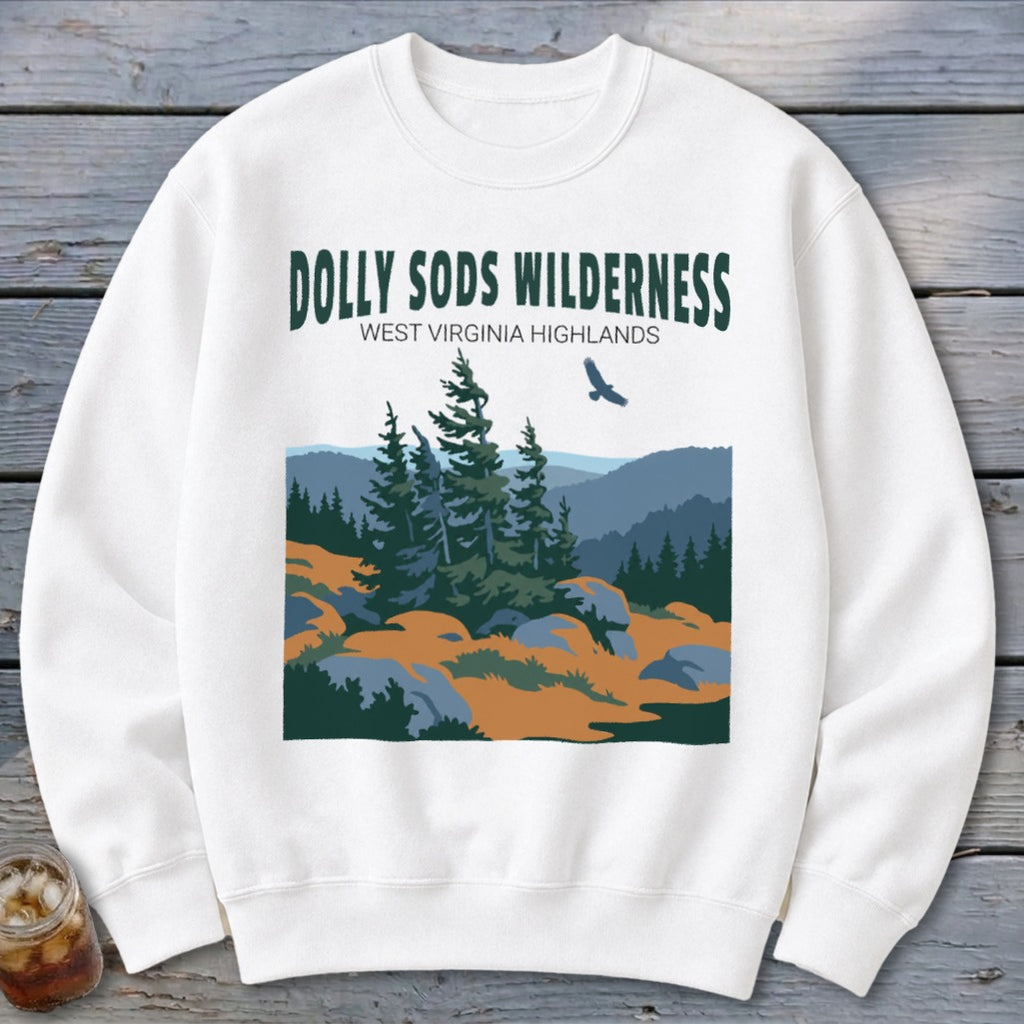 White crewneck sweatshirt featuring a graphic of Dolly Sods Wilderness with pine trees and a flying bird.