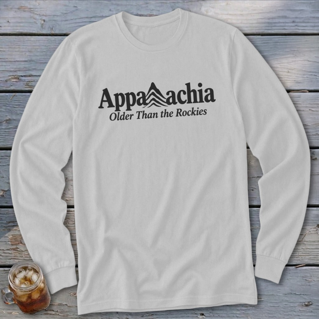 White long sleeve shirt with black text "Appalachia Older Than the Rockies".