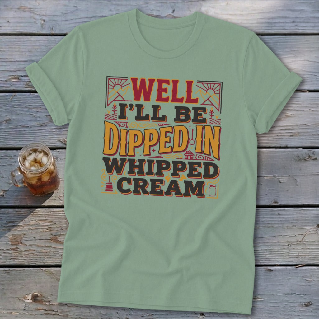 Green t-shirt with "WELL I'LL BE DIPPED IN WHIPPED CREAM" text graphic.