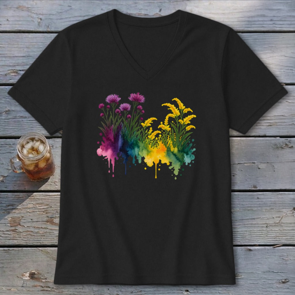 Black V-neck t-shirt with a watercolor floral design in purple, yellow, and rainbow colors.