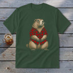Groundhog wearing a red and black plaid shirt on a green t-shirt.