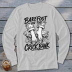 Long sleeve shirt with "BAREFOOT ON THE CRICK BANK" text and graphic.