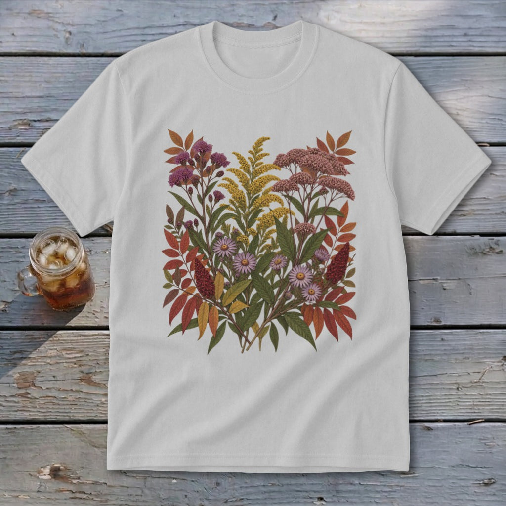 White t-shirt with a colorful floral and leaf print on the chest.