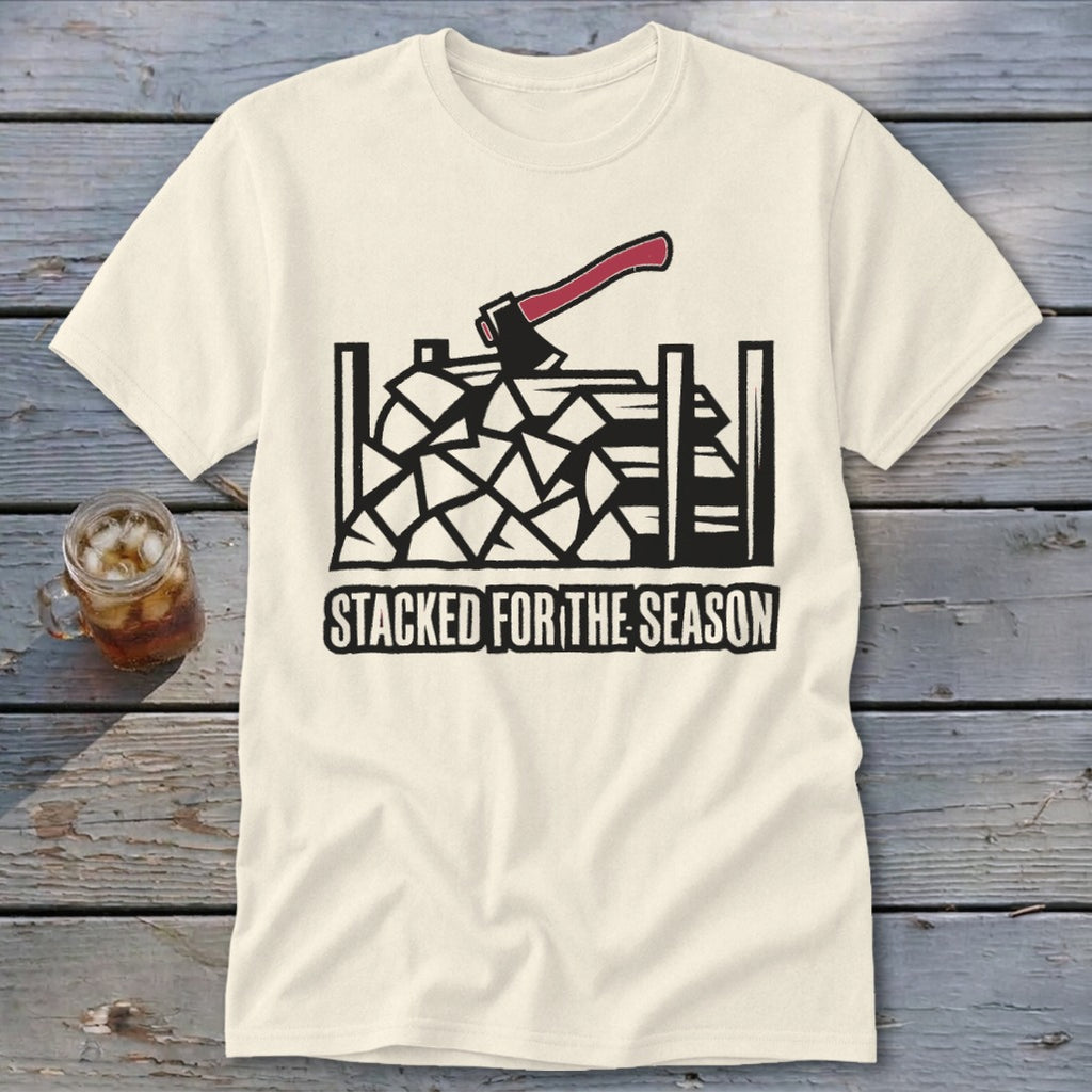 Cream t-shirt with stacked firewood and axe graphic and text "STACKED FOR THE SEASON".