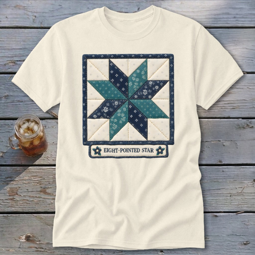 Cream t-shirt featuring a quilted eight-pointed star design with text.