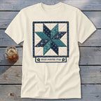 Cream t-shirt featuring a quilted eight-pointed star design with text.