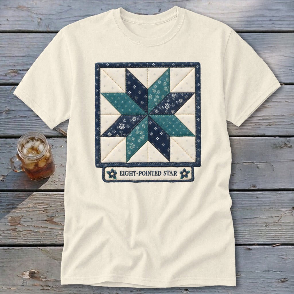 Cream t-shirt featuring a quilted eight-pointed star design with text.