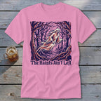 Pink t-shirt with ghost in spooky forest and text "The Haints Ain't Left".