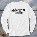A white long-sleeved t-shirt with the words Melungeon Heritage printed in black on the chest.