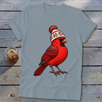 Light gray short-sleeve t-shirt featuring a cartoon cardinal wearing a red and white winter beanie.